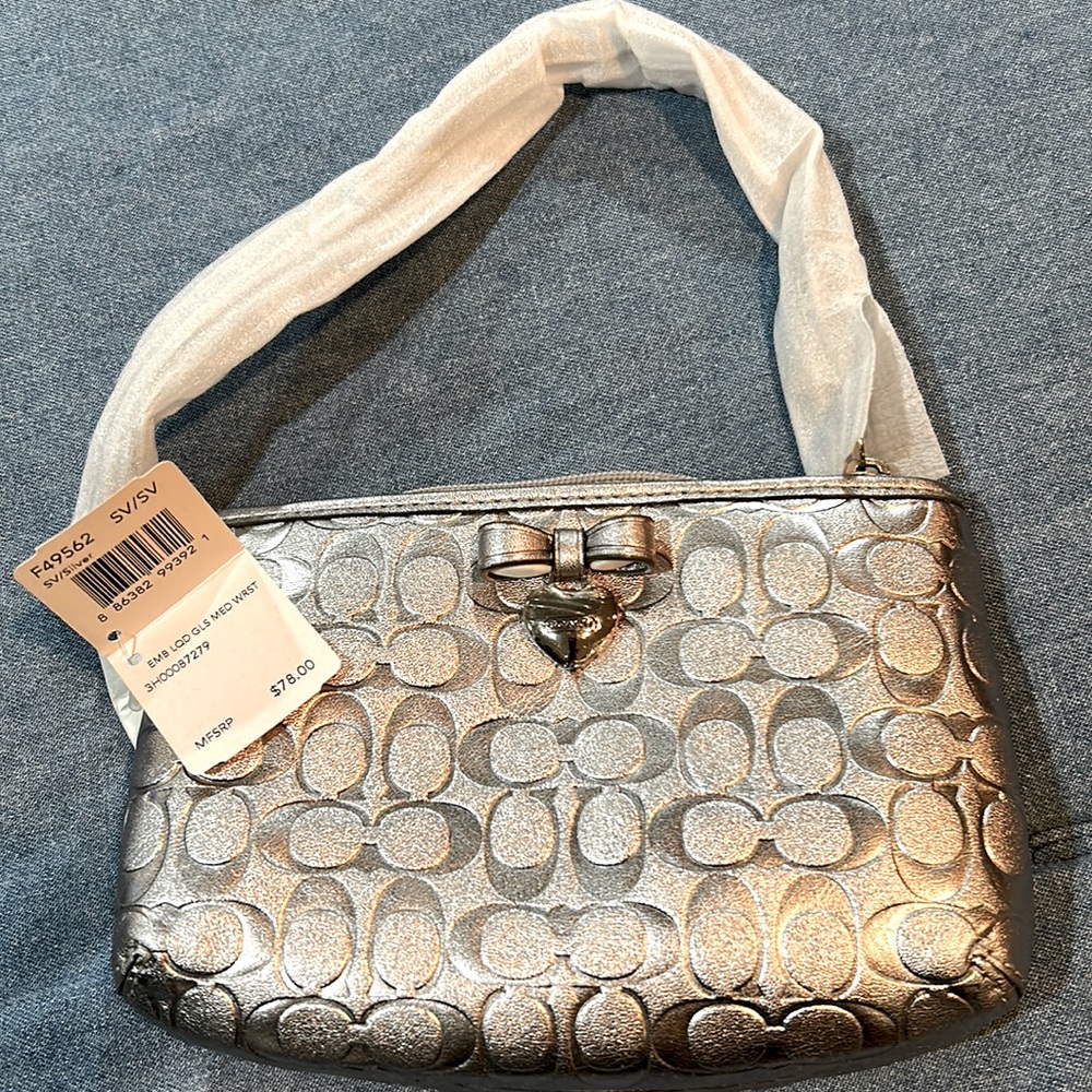 Coach Silver 8” Wristlet Embossed Logo